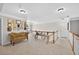 Loft area features carpet flooring, railing, and a decorative sofa with accent tables at 2002 Ivy Ridge Se Rd, Smyrna, GA 30080