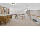 Loft area features carpet flooring, railing, and a decorative sofa with accent tables at 2002 Ivy Ridge Se Rd, Smyrna, GA 30080