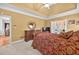 Serene main bedroom with tray ceilings, walk-in closet and king-size bed at 2002 Ivy Ridge Se Rd, Smyrna, GA 30080