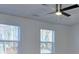 Bedroom with two windows and ceiling fan at 4185 Duesenberg Dr, Tucker, GA 30084