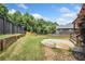 Spacious backyard with a wooden fence and patio at 4465 Saint Andrews Crest Dr, Cumming, GA 30040