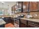 Functional kitchen showcasing granite countertops, stainless steel appliances, and plenty of cabinet space for efficient cooking at 4465 Saint Andrews Crest Dr, Cumming, GA 30040