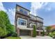 Attractive multi-story brick townhome with garage and well-maintained landscaping at 504 E Howard Ave, Decatur, GA 30030