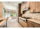 Well-equipped kitchen with custom cabinetry, high-end appliances, and a breakfast nook at 504 E Howard Ave, Decatur, GA 30030
