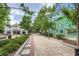 Neighborhood park with decorative art, inviting green space, and walkable sidewalks at 504 E Howard Ave, Decatur, GA 30030