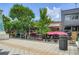 Neighborhood restaurant with outdoor seating and shade under umbrellas at 504 E Howard Ave, Decatur, GA 30030