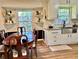 Cozy dining area adjacent to the kitchen, featuring stylish decor and natural light at 5347 Ocarol Ct, Stone Mountain, GA 30088
