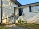Inviting front entrance with updated iron railing and brick steps at 5347 Ocarol Ct, Stone Mountain, GA 30088