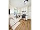 Bright kitchen with stainless steel appliances, granite countertops, and white cabinets at 5347 Ocarol Ct, Stone Mountain, GA 30088