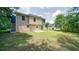 Spacious backyard of this home featuring a large lawn and a back door entry at 2161 Denson Sw Ln, Marietta, GA 30008