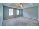 Spacious bedroom with vaulted ceiling, fan, and plenty of natural light at 2161 Denson Sw Ln, Marietta, GA 30008