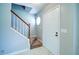 Welcoming entryway featuring a staircase and a side window that provides great light at 2161 Denson Sw Ln, Marietta, GA 30008