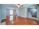 Bright living room with hardwood floors and a staircase that leads to the upper level at 2161 Denson Sw Ln, Marietta, GA 30008
