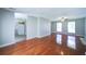 Bright living room featuring hardwood floors and access to the kitchen at 2161 Denson Sw Ln, Marietta, GA 30008