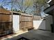 Small backyard area with door access and plants at 4383 Idlewood Ln, Tucker, GA 30084