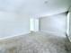 Neutral bedroom with carpet and ample light, perfect for rest and relaxation at 4383 Idlewood Ln, Tucker, GA 30084