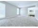 Spacious bedroom with plush carpet and access to a full ensuite bathroom at 4383 Idlewood Ln, Tucker, GA 30084
