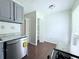 Bright kitchen featuring granite countertops, stainless steel appliances and hardwood flooring at 4383 Idlewood Ln, Tucker, GA 30084