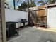 Backyard patio with grill, a/c unit and access to the house at 4383 Idlewood Ln, Tucker, GA 30084