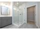 Bathroom with a vanity, tiled floor, and a walk-in glass shower near the closet at 510 Winston Croft Cir # 56, Johns Creek, GA 30022