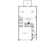 Main level floor plan features kitchen, dining room, Gathering room, 2-car garage and covered porch at 510 Winston Croft Cir # 56, Johns Creek, GA 30022