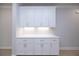 Bright kitchen with white cabinets and quartz countertops at 510 Winston Croft Cir # 56, Johns Creek, GA 30022