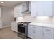 Modern kitchen with stainless steel appliances and white cabinets at 510 Winston Croft Cir # 56, Johns Creek, GA 30022