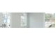 Bright living area features multiple windows with neighborhood views at 510 Winston Croft Cir # 56, Johns Creek, GA 30022