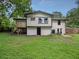 Two-story home featuring a spacious backyard, perfect for outdoor activities at 5207 White Sw Blvd, Mableton, GA 30126