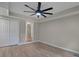 Bedroom with ceiling fan, great natural light and laminate floor at 5207 White Sw Blvd, Mableton, GA 30126