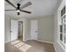 Bedroom with ceiling fan, great natural light and laminate floor at 5207 White Sw Blvd, Mableton, GA 30126
