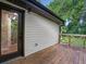 Wooden deck off the house with a modern railing and exterior door at 5207 White Sw Blvd, Mableton, GA 30126