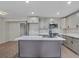 Modern kitchen with a large island, stainless steel appliances, and stylish countertops at 5207 White Sw Blvd, Mableton, GA 30126
