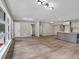 Spacious living room with hardwood floors and modern lighting at 5207 White Sw Blvd, Mableton, GA 30126