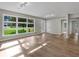 Bright living room featuring large windows, hardwood floors at 5207 White Sw Blvd, Mableton, GA 30126
