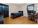 Comfortable bedroom with ample natural light, hardwood floors, and space for rest and relaxation at 761 Robert E Lee Pkwy, Jonesboro, GA 30238