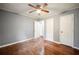 Bedroom with hardwood floors, ceiling fan, and ample natural light at 1089 Indale Sw Pl, Atlanta, GA 30310