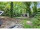 Spacious backyard with a shed and mature trees, offering privacy at 1279 Kenilworth Sw Dr, Atlanta, GA 30310