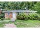 Traditional brick home with a front door and mature landscaping at 1279 Kenilworth Sw Dr, Atlanta, GA 30310