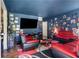 Stylish living room showcasing colorful furniture and a modern entertainment center at 1279 Kenilworth Sw Dr, Atlanta, GA 30310