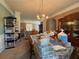 Traditional dining room featuring a chandelier and space for entertaining at 3139 Tuscan Ridge Dr, Snellville, GA 30039