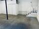 Basement with concrete floors, storage closet, and stairs at 4007 Stacy Ln, Snellville, GA 30039