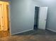 Bedroom features gray walls, carpet flooring and a closet with an open door at 4007 Stacy Ln, Snellville, GA 30039