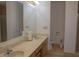 Bathroom featuring double sinks, a large mirror, a toilet and walk-in shower at 4640 Calleigh Way, Snellville, GA 30039