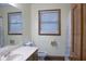 Bathroom featuring a toilet, a window and a shower with patterned curtain at 4640 Calleigh Way, Snellville, GA 30039