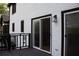 Exterior view of home's deck with black railings and nearby slider, a great outdoor space at 4640 Calleigh Way, Snellville, GA 30039
