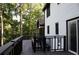 A view from the home's deck overlooking trees, a great space to relax outdoors at 4640 Calleigh Way, Snellville, GA 30039