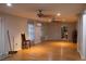 Spacious living room with hardwood floors, ceiling fans, and natural light at 4640 Calleigh Way, Snellville, GA 30039