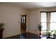 Living room with hardwood floors, bay windows, and plants at 4640 Calleigh Way, Snellville, GA 30039