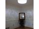 Elegant living room with chandelier, hardwood floors and light walls with base molding at 4640 Calleigh Way, Snellville, GA 30039
